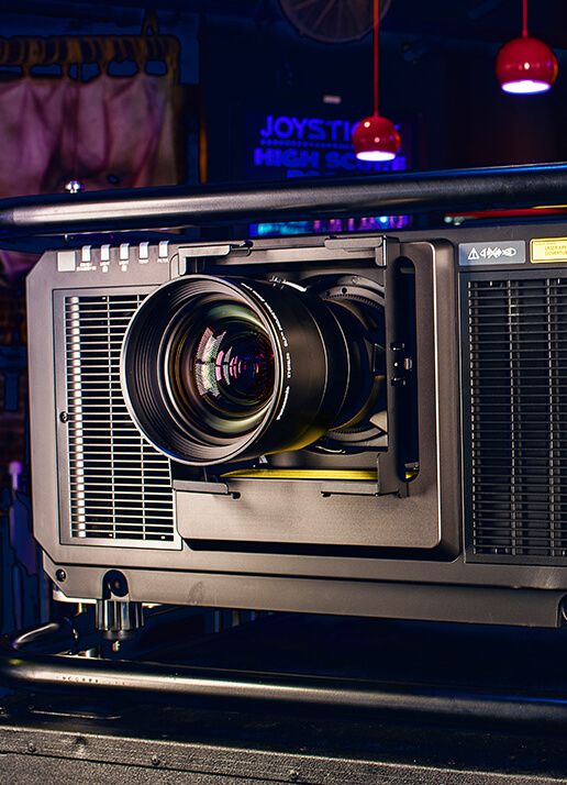 A projector is sitting on top of a table.