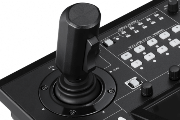 A close up of a controller with buttons on it.
