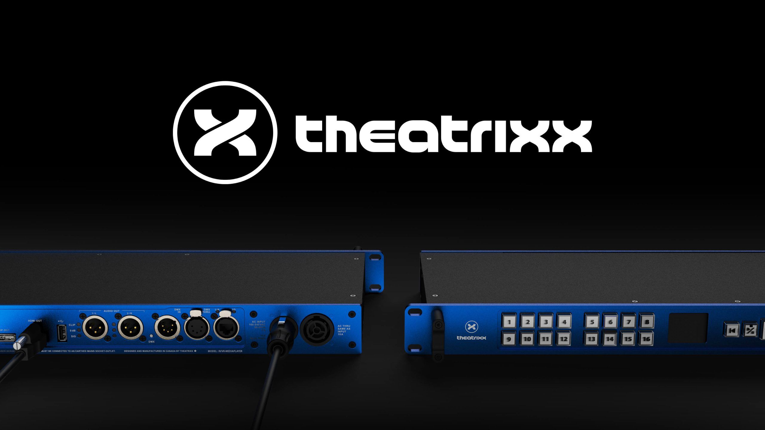 A pair of blue audio mixers with the word theatrix on them can be used for projection in a theater setting with Barco or Panasonic equipment.