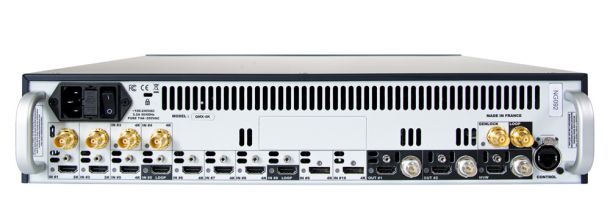 The front of a computer system with a large number of inputs and outputs.