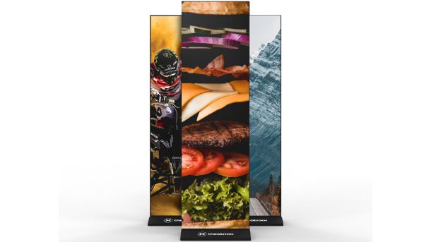 A tall display stand with a picture of food on it.