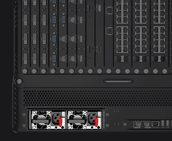 The back of a black server with a number of ports.