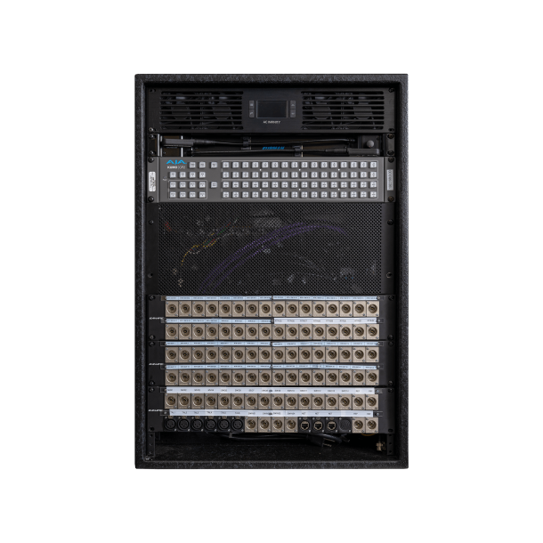 The back of a rack with a large number of cables.